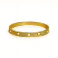 Radiant Gold Textured Bangle with Crystal Accents